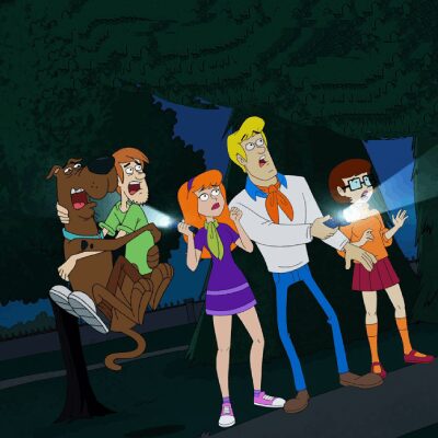 the Scooby Doo gang looking fearfully at something offscreen